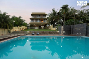 StayVista's Rivulet Waters - Lakefront Villa with Infinity Pool, Jacuzzi, Lawn, and Rustic Gazebo